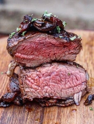 Bacon Wrapped Filet is sliced on the cutting board and ready to eat!