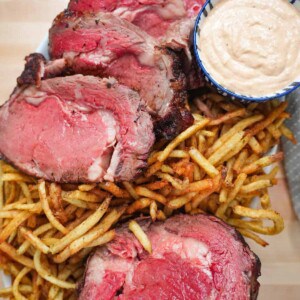 Smoked Fried Prime Rib on a serving platter with fries.