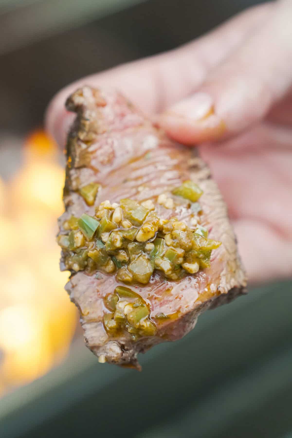 A close up of the Diablo Steak with all its spicy goodness layered on top.