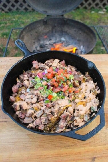 Grilled Steak Potato Wedges garnished and served.