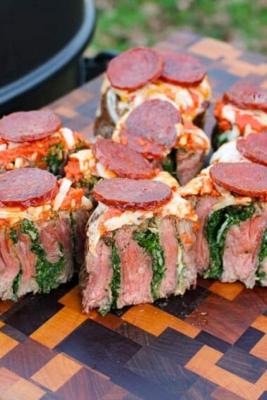 Skirt Steak Pizza Pinwheels sliced and served.