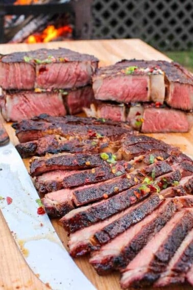 Sliced ribeyes on the platter.