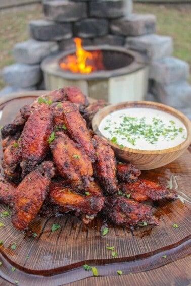 Nashville Hot Chicken Wings on a cutting board with Alabama White Sauce.