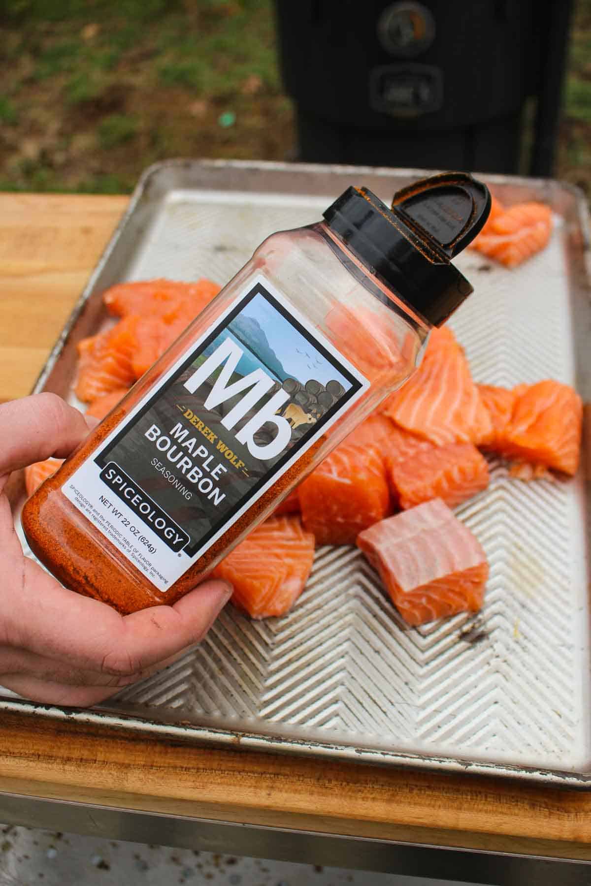 Close up of Maple Bourbon Seasoning Bottle. Learn how to use this Bourbon BBQ Rub in this article!