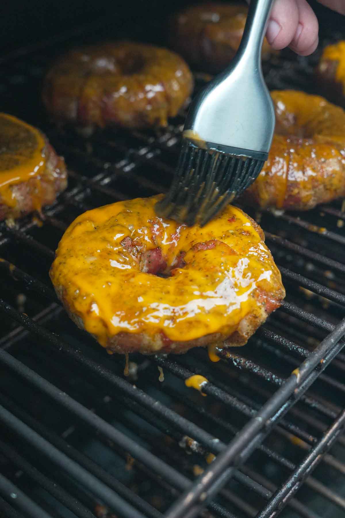 Buffalo Chicken Stuffed Onion Rings is a fun recipe that makes "onion rings" out of bacon and chicken.