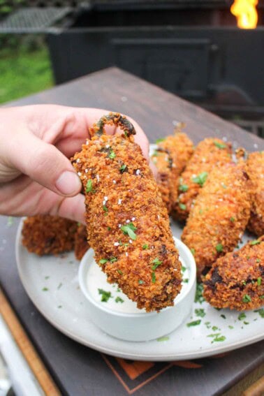 Smoked fried jalapeño poppers, ready to dip in dressing.