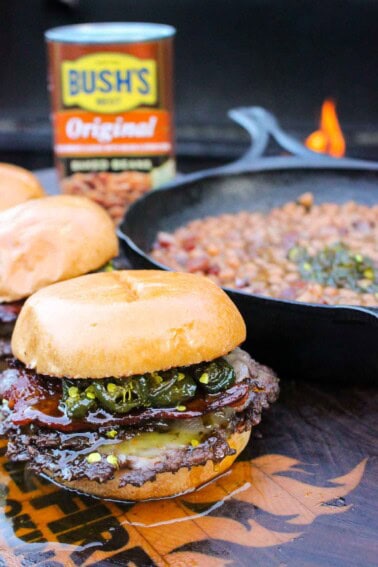 Cowboy candy on a burger with a side of Bush's Original Baked Beans.