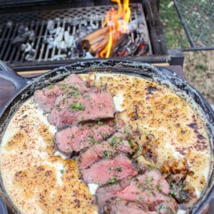 Smoked Steak Queso Dip cooked Over the Fire.