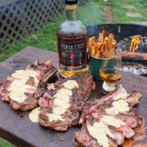 Steak with Peppercorn Cream Sauce and Pendleton Midnight Whisky served up.