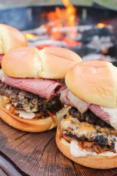 Three Steakhouse Smash Burger lined up and ready to serve.