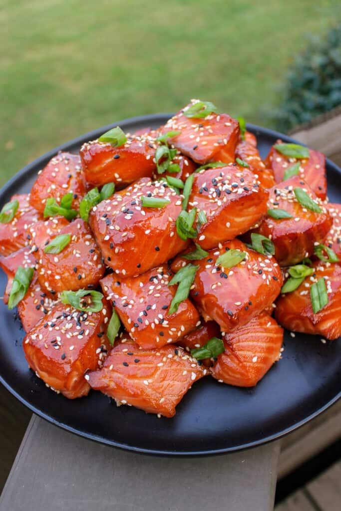 Smoked Salmon Burnt Ends garnished and served.