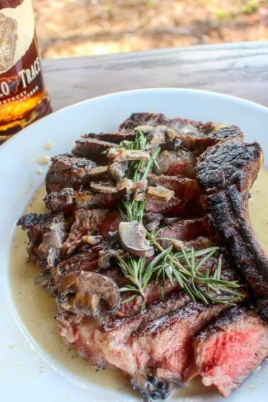Ribeye with bourbon cream sauce on the plate