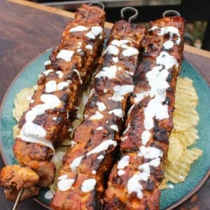 The chicken kabobs are drizzled with the cool ranch sauce.
