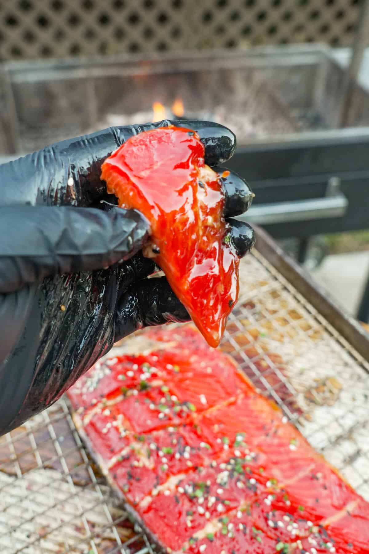 A single bite of the smoked candied salmon. The bright color and intense flavors are insane.