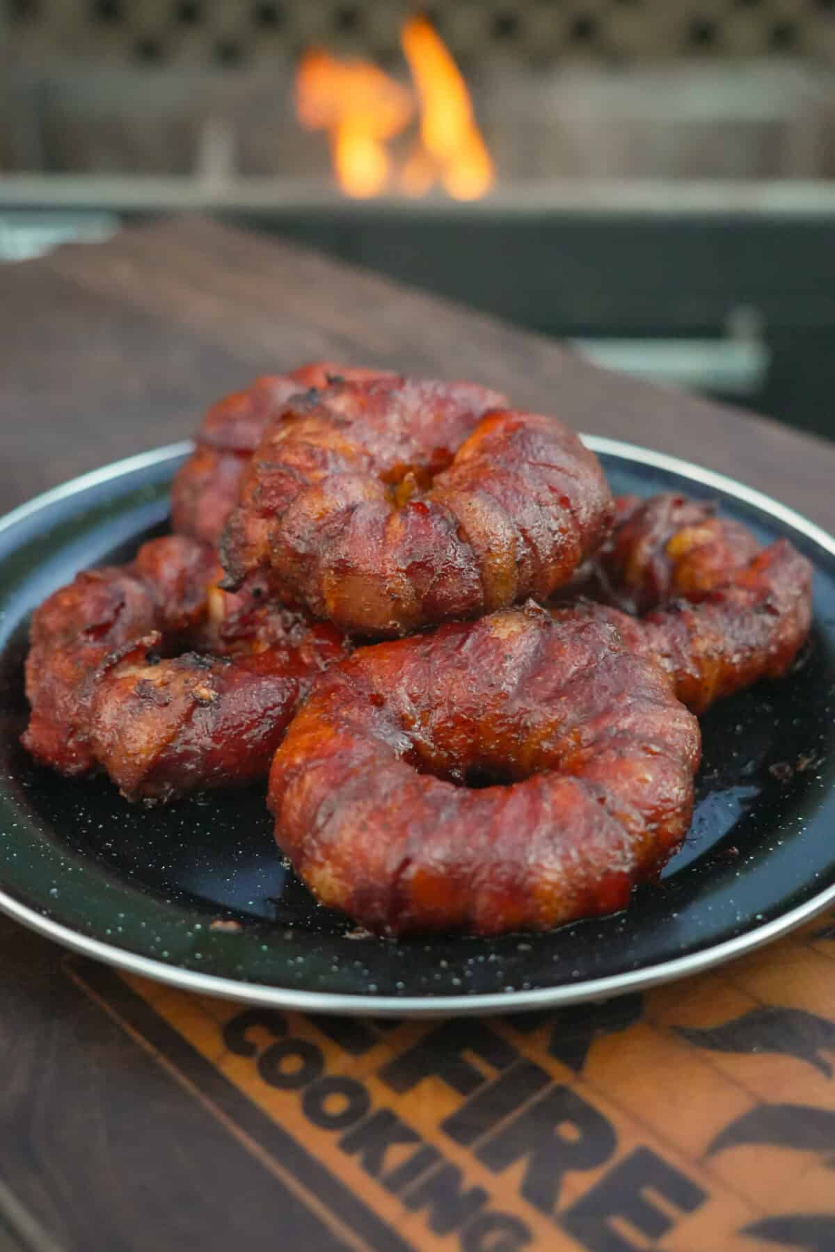 Cowboy Stuffed Onion rings piled on a serving plate.