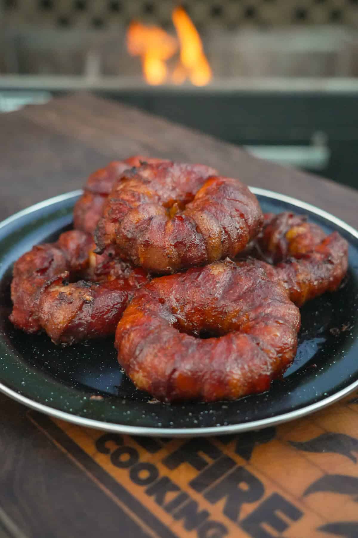 Cowboy Stuffed Onion rings piled on a serving plate.