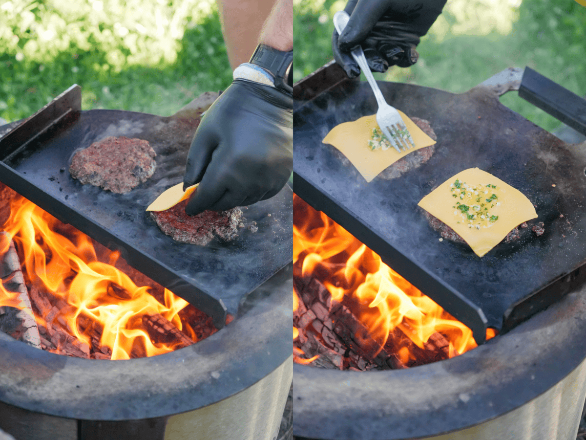 Derek is a master of the Breeo smokeless fire pit. Here he is wearing safety gloves, making burgers, adding slices of American cheese on 80/20 beef.