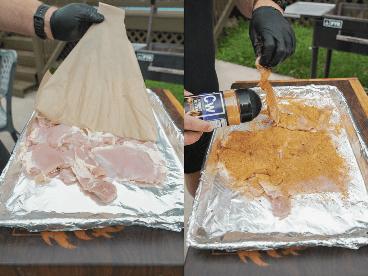 Pulling back parchment paper to reveal thinly pounded boneless chicken thighs and seasoning the chicken with Derek Wolf's Cowboy Butter Seasoning