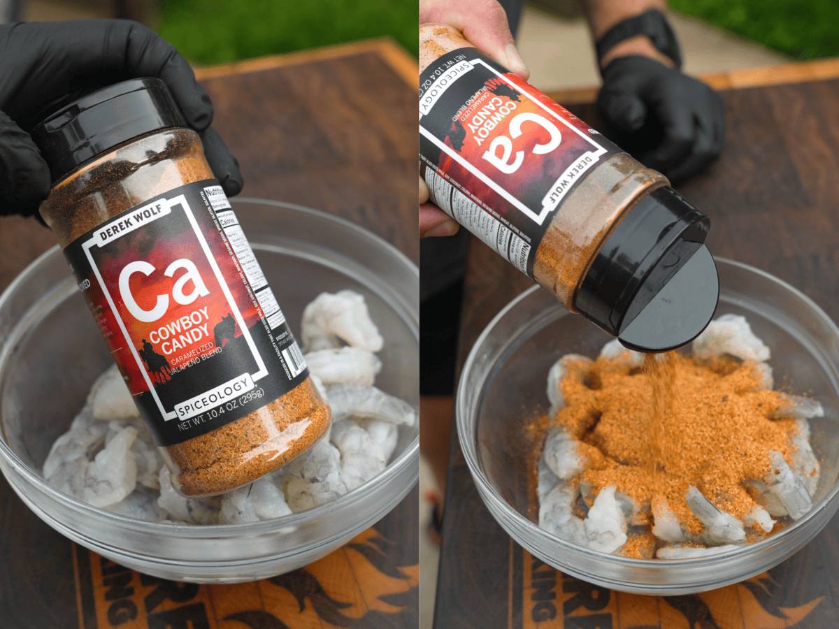 Pouring Cowboy Candy Seasoning into a glass bowl of raw shrimp