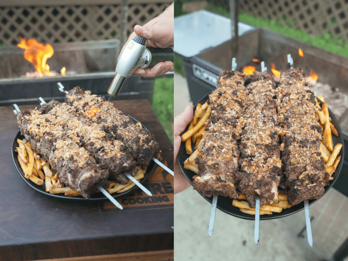 Derek Wolf finalizes the crust on the tasty steak skewers with a torch.