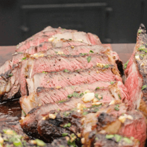 A sliced ribeye so you can see the perfectly cooked center.
