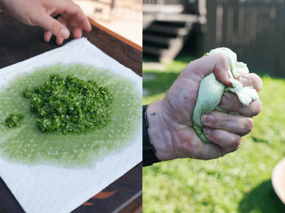 The liquid is removed from the herbs before adding the ground beef by squeezing it through a paper towel.