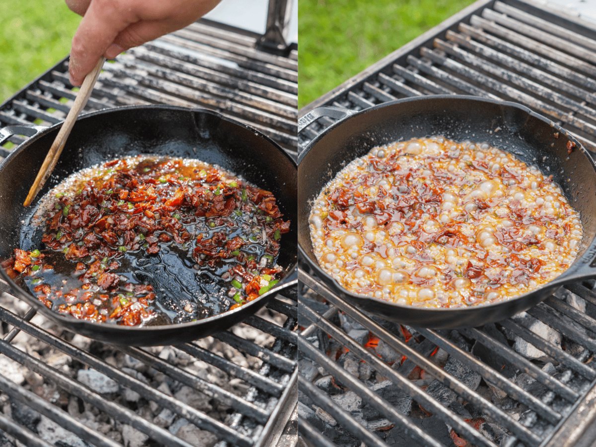 Simmering all the ingredients for bacon jam in a cast iron skillet on the grill, and stirring with a wooden spoon